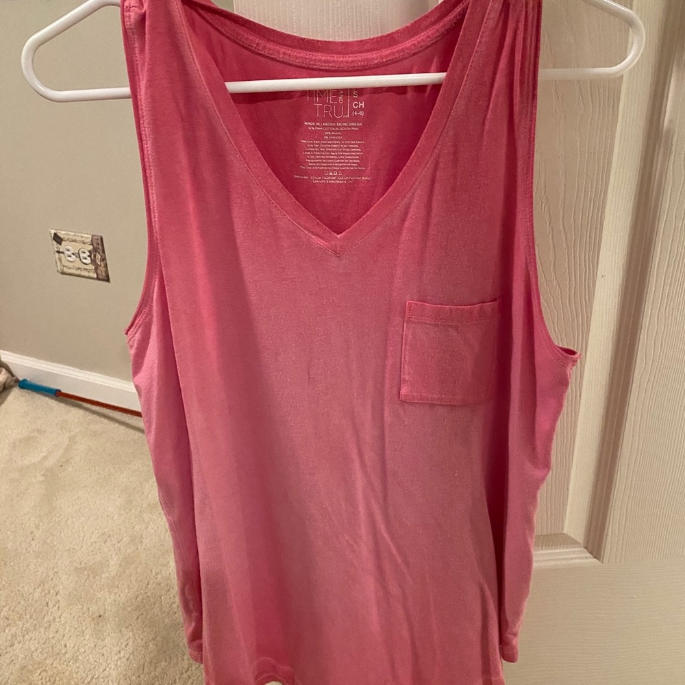 Light pinkish red lightweight sleeveless top.